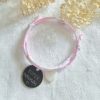 Bracelet médaille gravée Super Nounous sur cordon Betsy rose clair